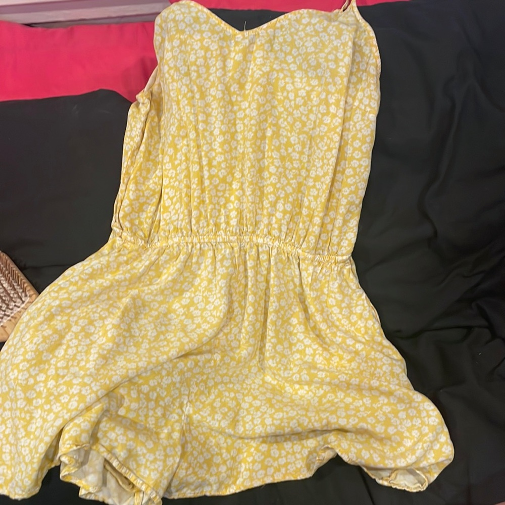 Romper from H&M. Used. Yellow. Floral print. Large